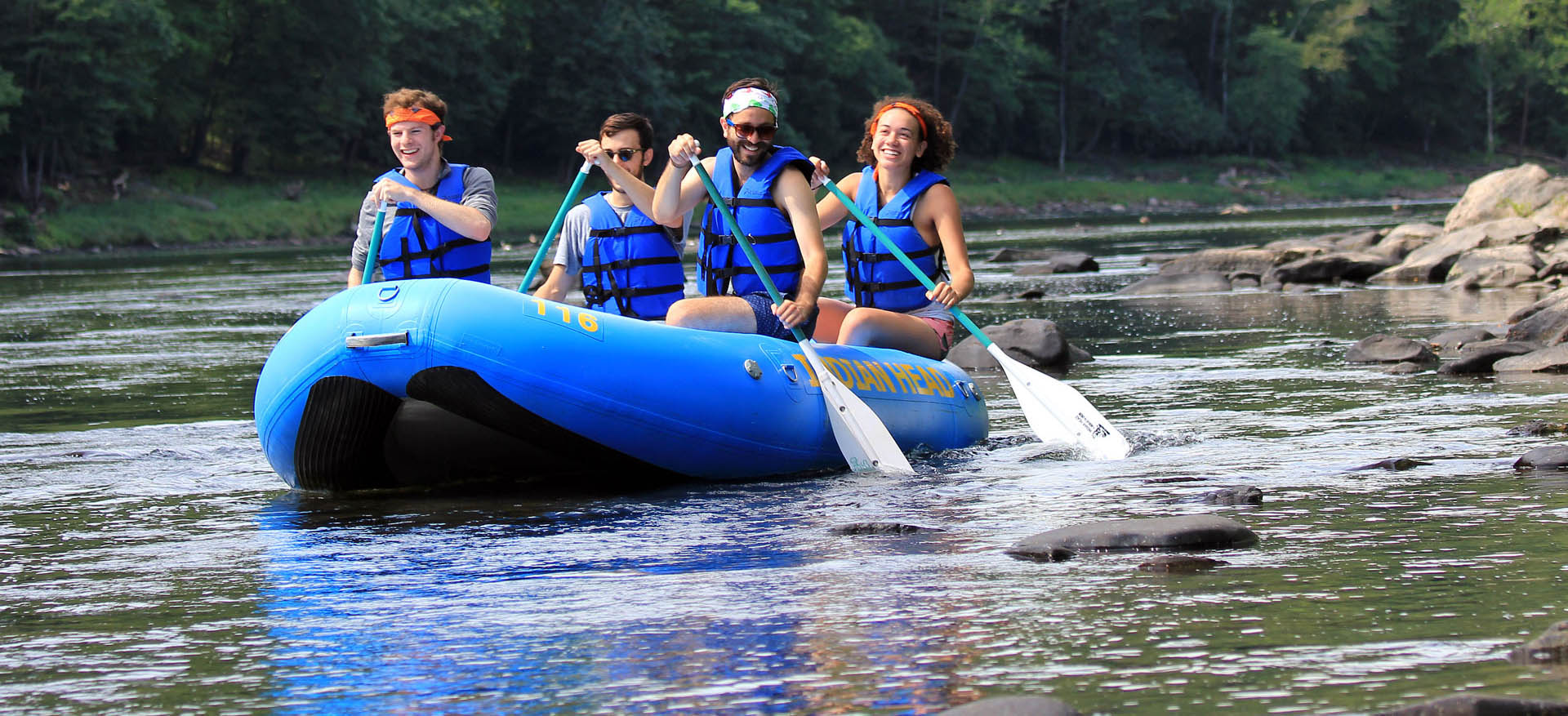 People rafting delaware river