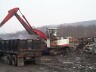 Scrap is Loaded into Dump Trailers