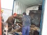 Containers are Loaded Using Forklifts and Manpower