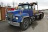 1997 Mack RD688S Tandem Axle Roll Off Truck